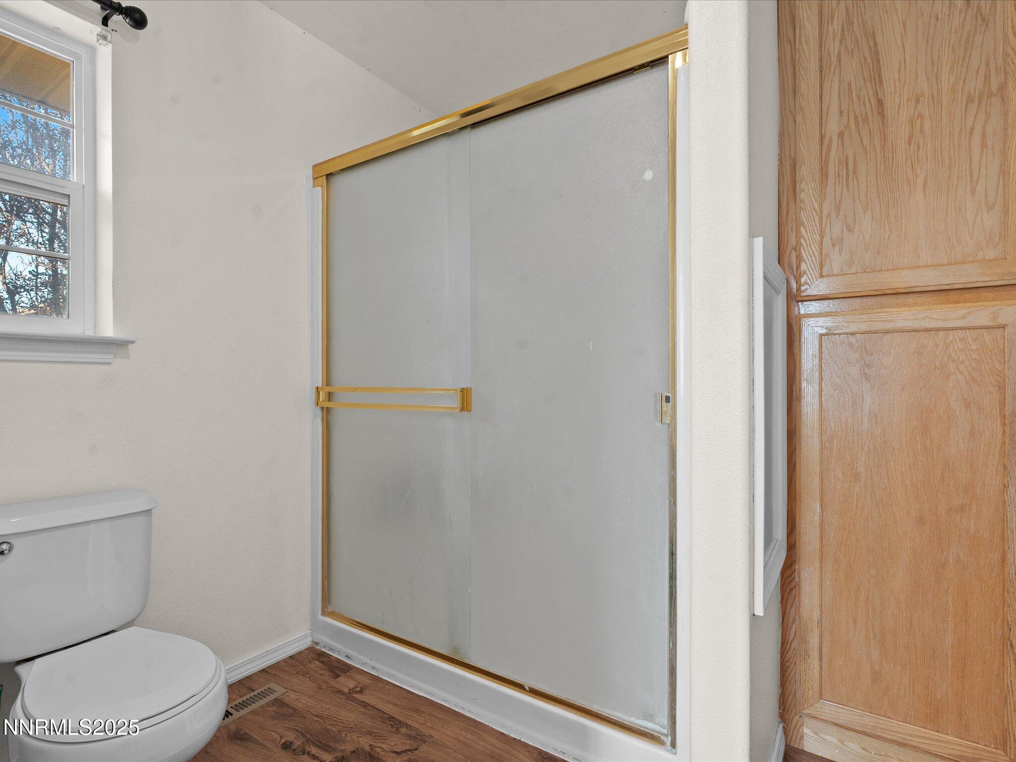 1819 Bogie Court Fernley, NV 89408 - Photo 22 of 46 a bathroom with a toilet and a shower