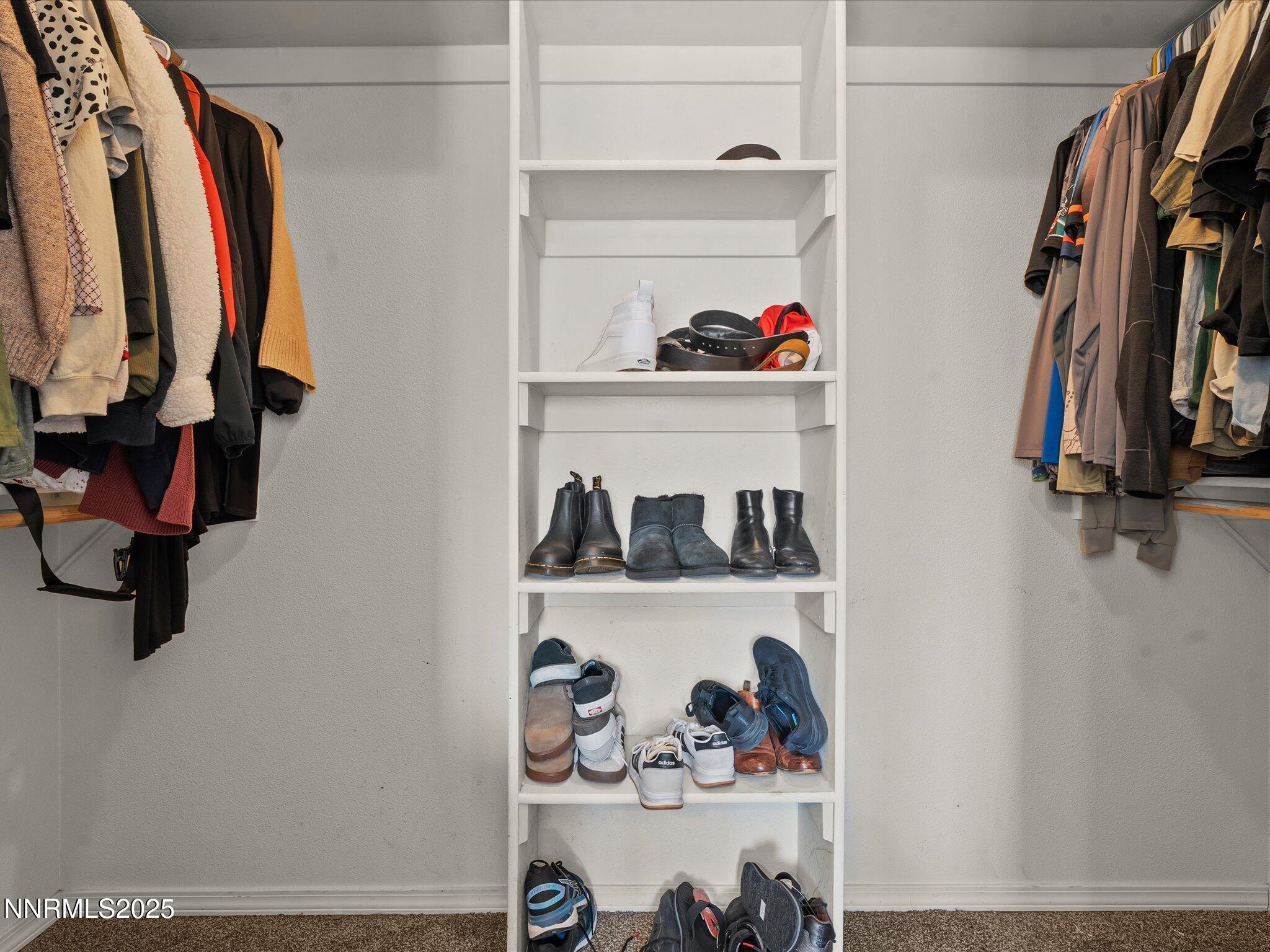 1819 Bogie Court Fernley, NV 89408 - Photo 24 of 46 a view of walk in closet with clothes and shoes