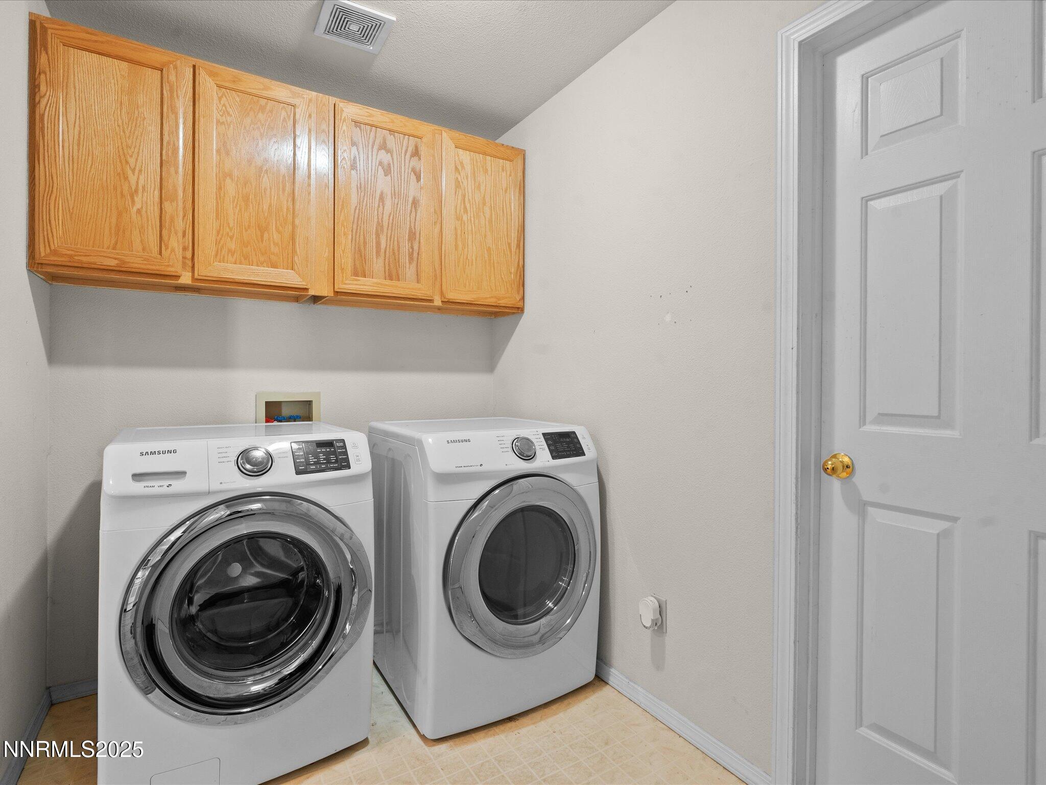 1819 Bogie Court Fernley, NV 89408 - Photo 30 of 46 a utility room with dryer and washer