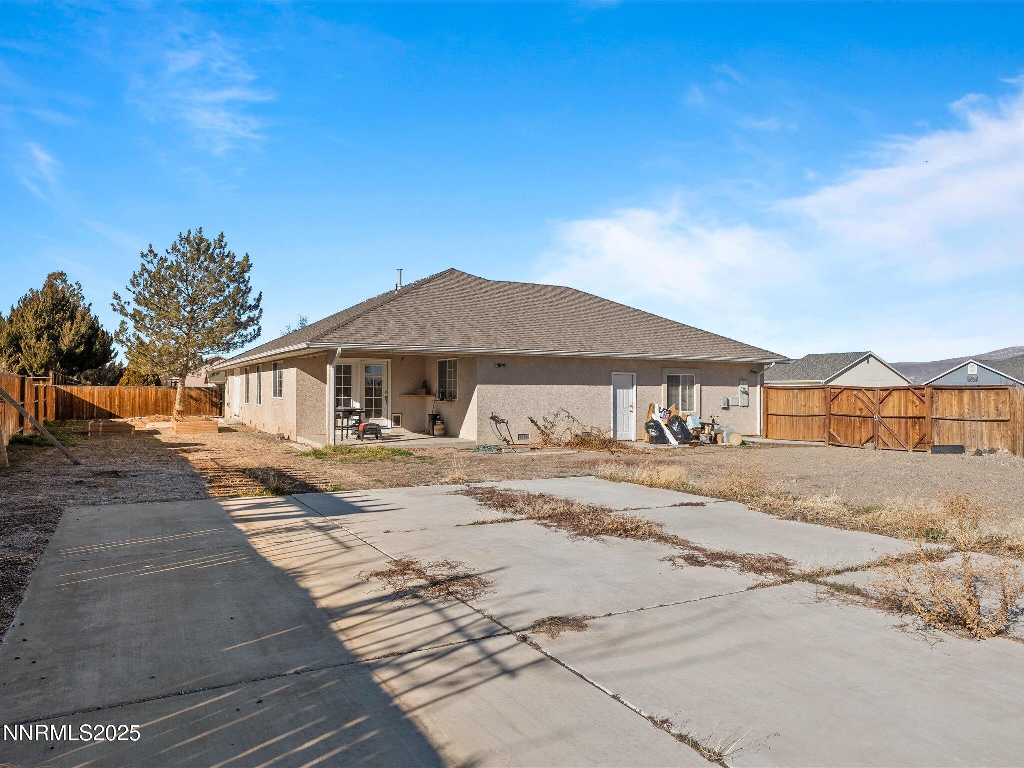 1819 Bogie Court Fernley, NV 89408 - Photo 34 of 46 a front view of a house with a yard