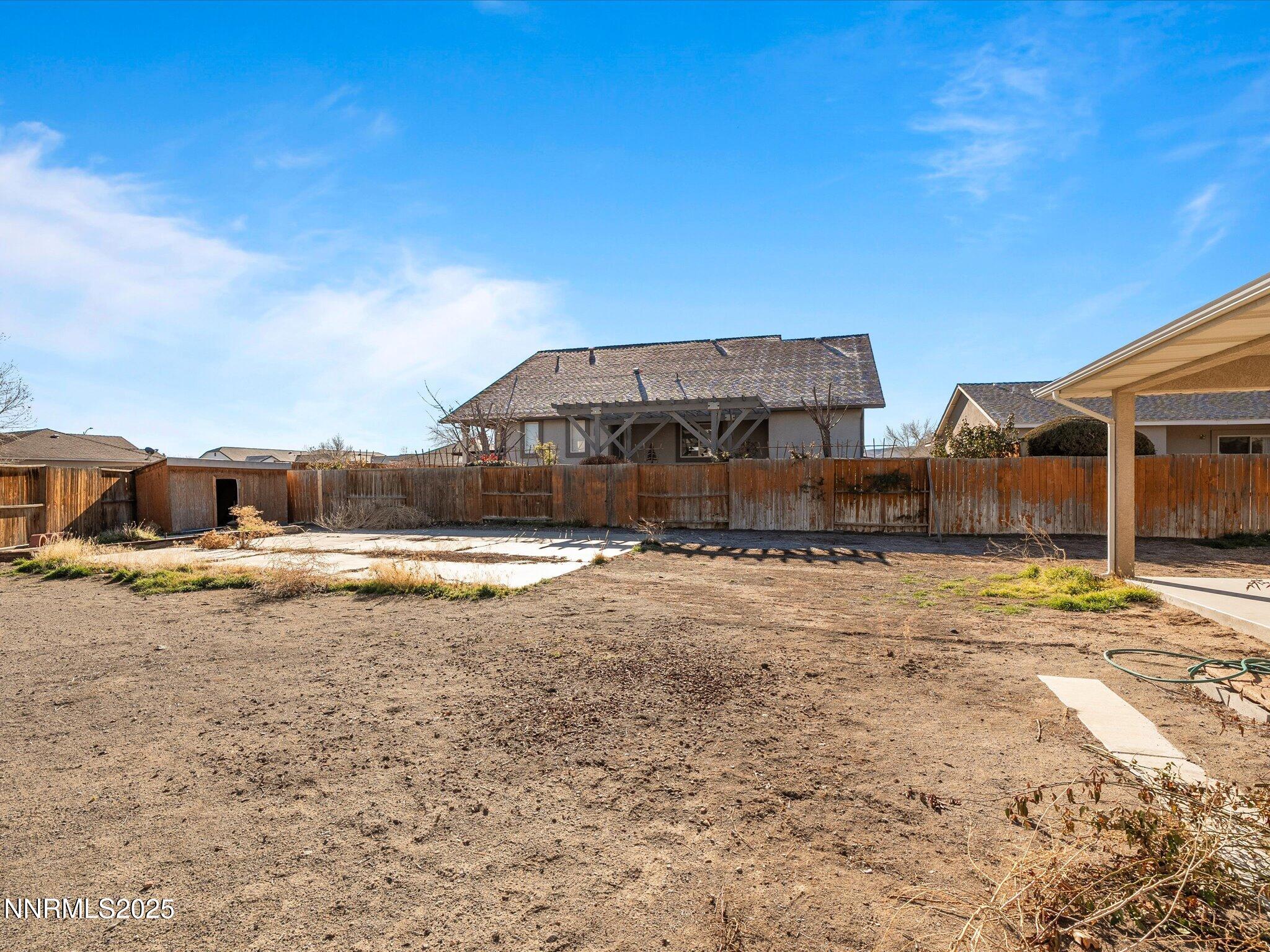 1819 Bogie Court Fernley, NV 89408 - Photo 35 of 46 a view of a houses with snow on the road