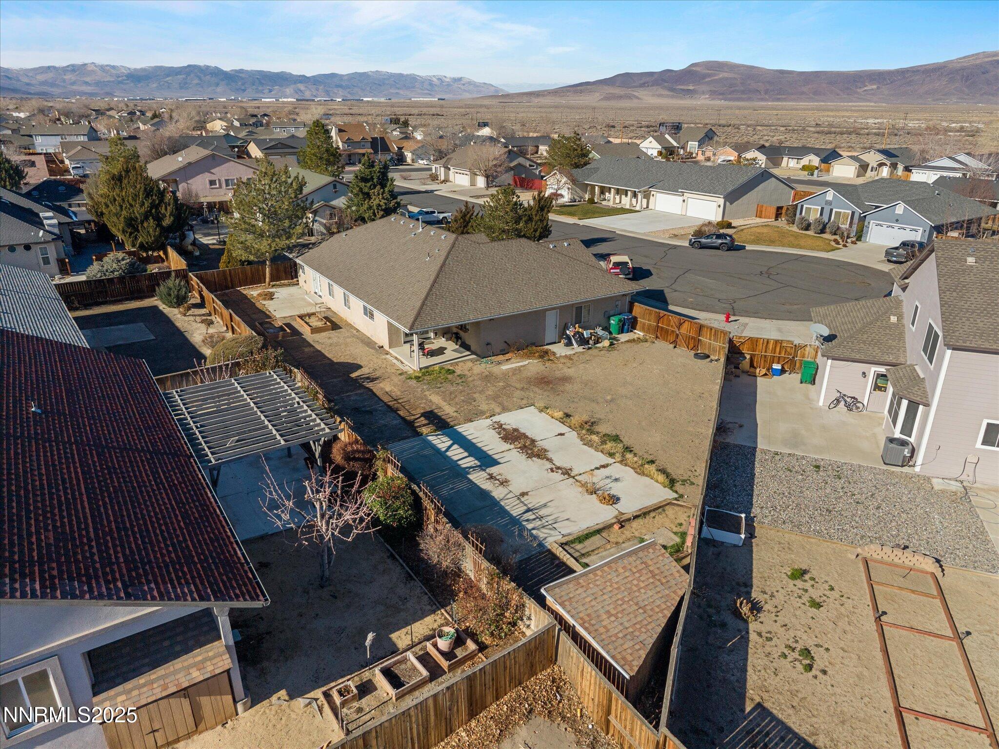 1819 Bogie Court Fernley, NV 89408 - Photo 39 of 46 an aerial view of residential houses with outdoor space