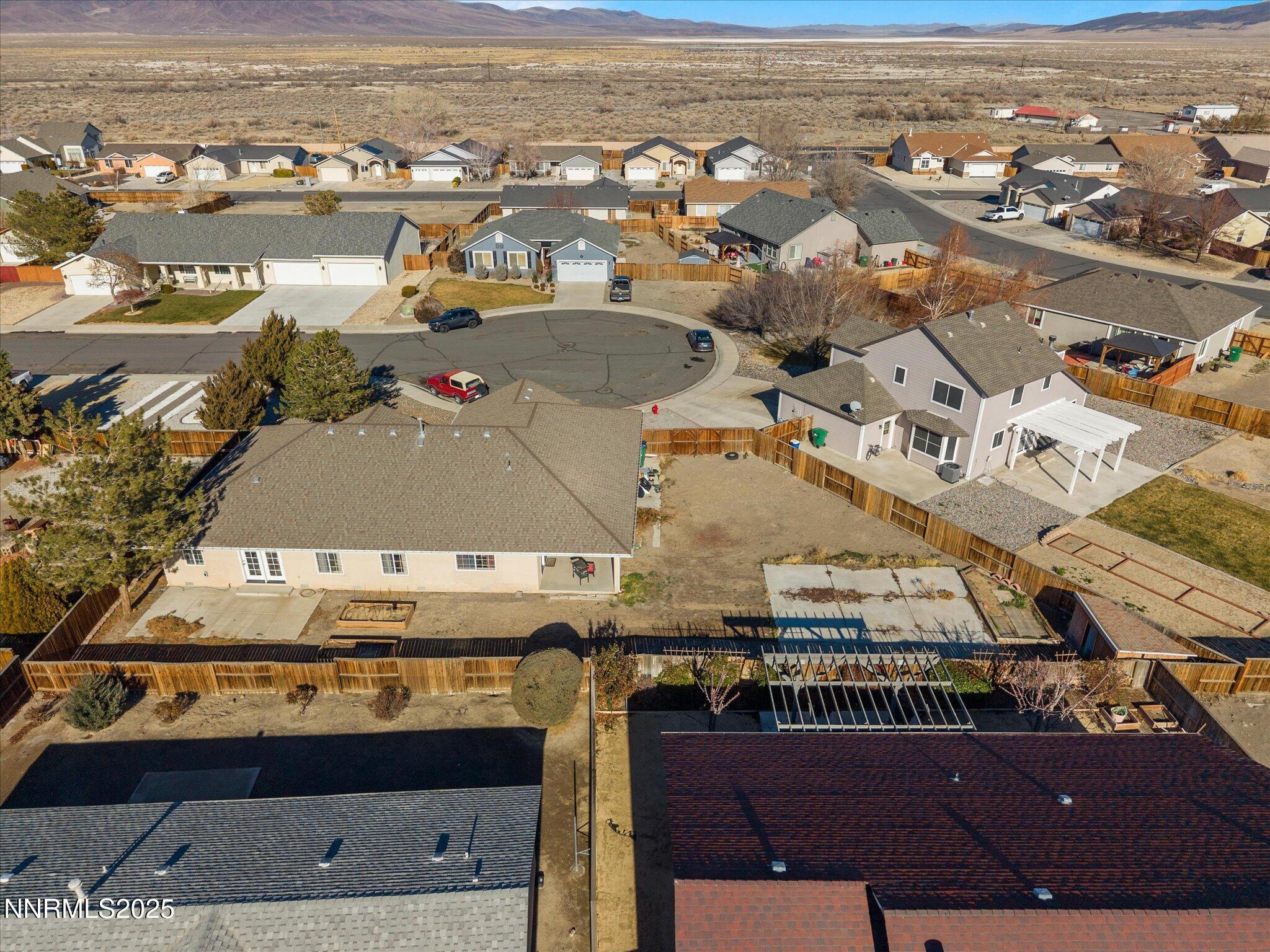 1819 Bogie Court Fernley, NV 89408 - Photo 40 of 46 an aerial view of residential houses with outdoor space