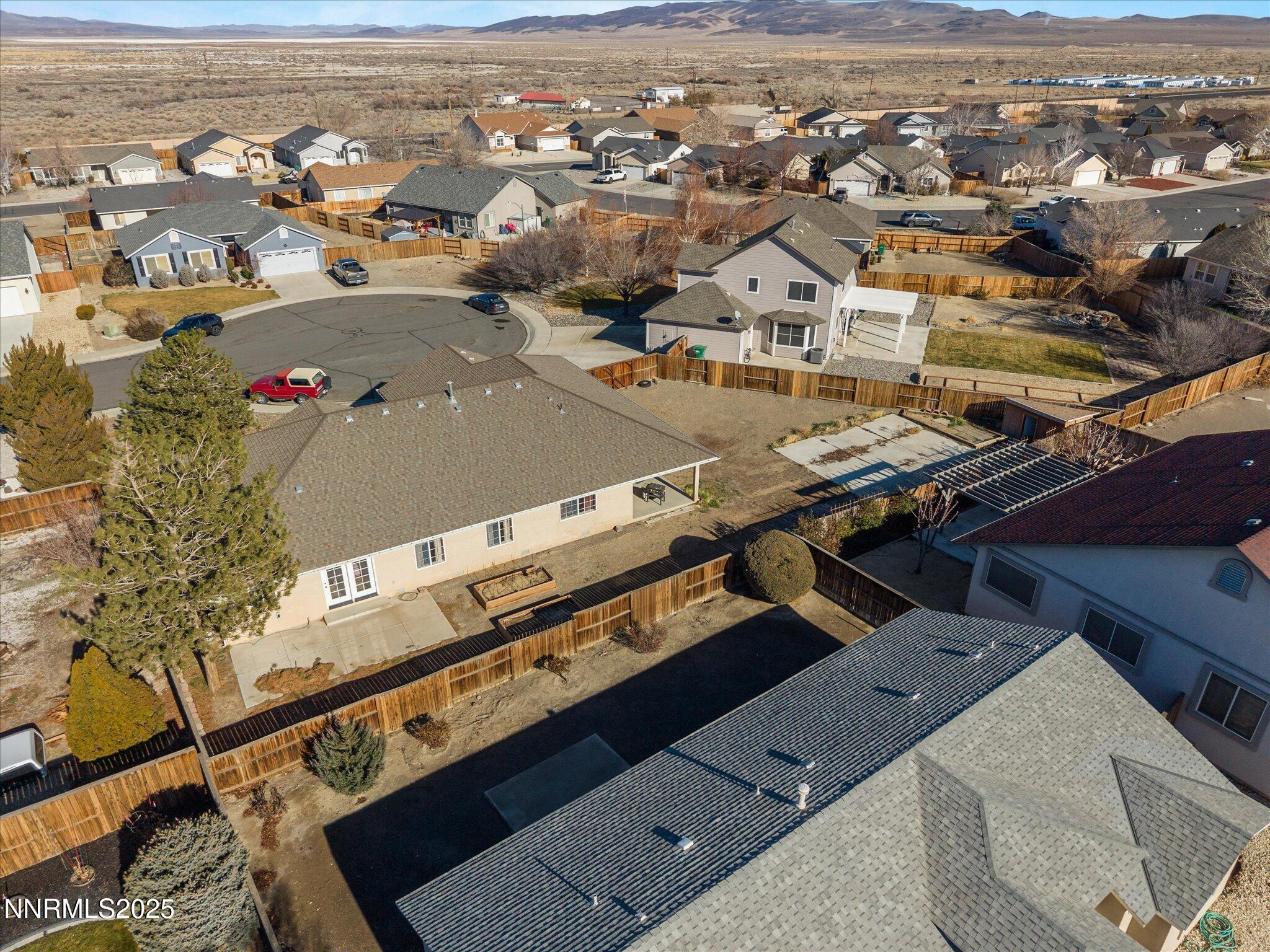 1819 Bogie Court Fernley, NV 89408 - Photo 41 of 46 an aerial view of residential houses with outdoor space