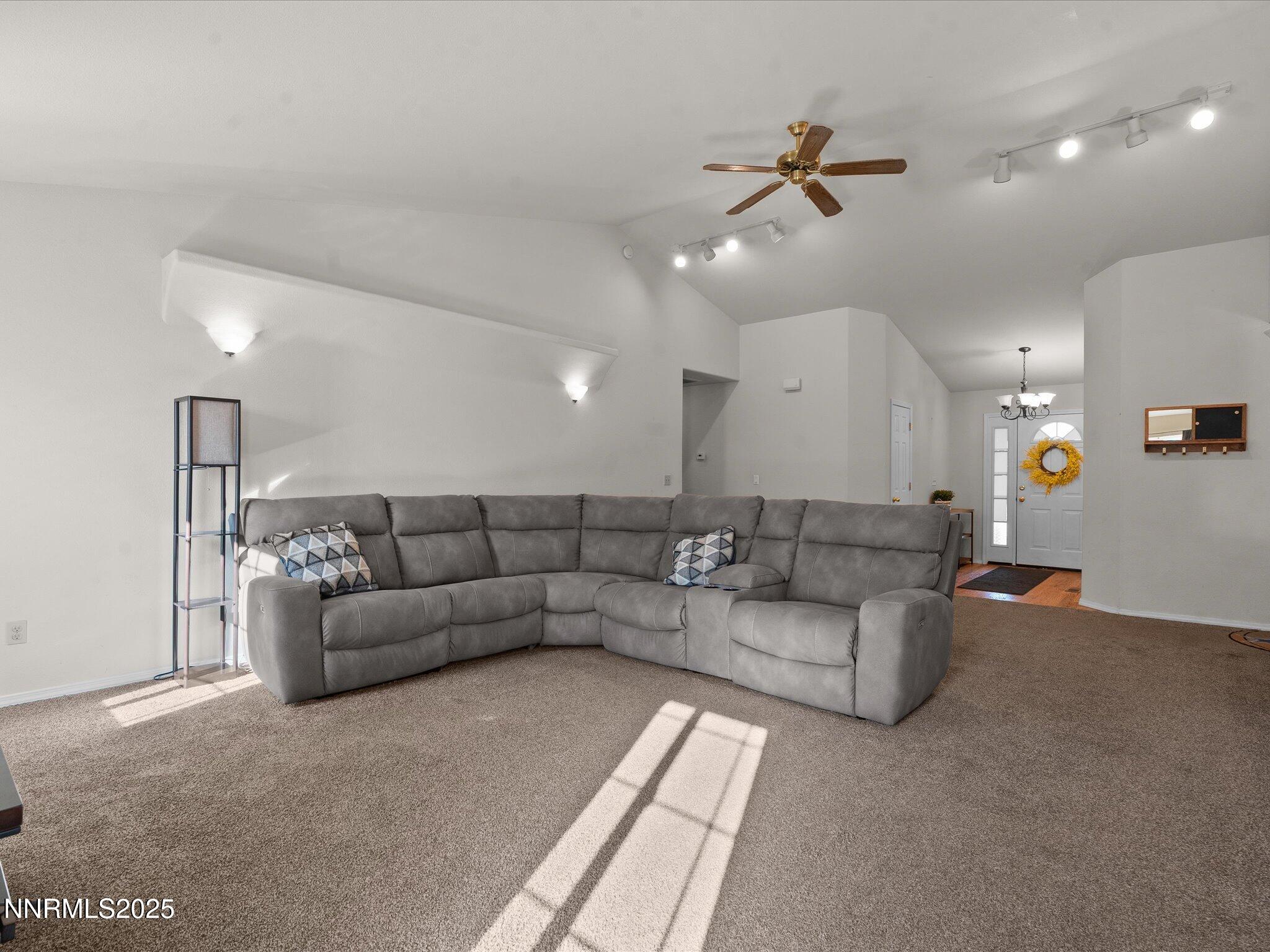 1819 Bogie Court Fernley, NV 89408 - Photo 6 of 46 a living room with furniture and a ceiling fan