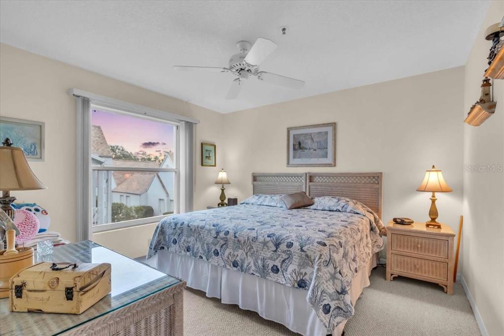 6713 Stone River Road, Unit 206 Bradenton, FL 34203 - Photo 22 of 58 a bedroom with a bed and a window
