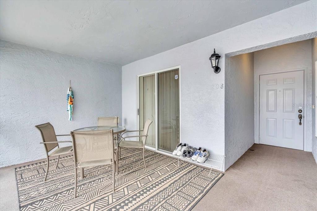 6713 Stone River Road, Unit 206 Bradenton, FL 34203 - Photo 8 of 58 a view of livingroom with furniture