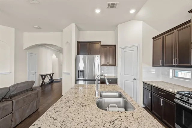 a view of wooden house with a park