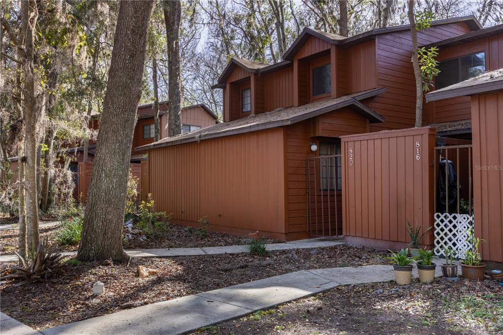 820 Southwest 55th Terrace Gainesville, FL 32607 - Photo 1 of 1 a view of a house with a yard