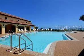 a view of swimming pool from a balcony