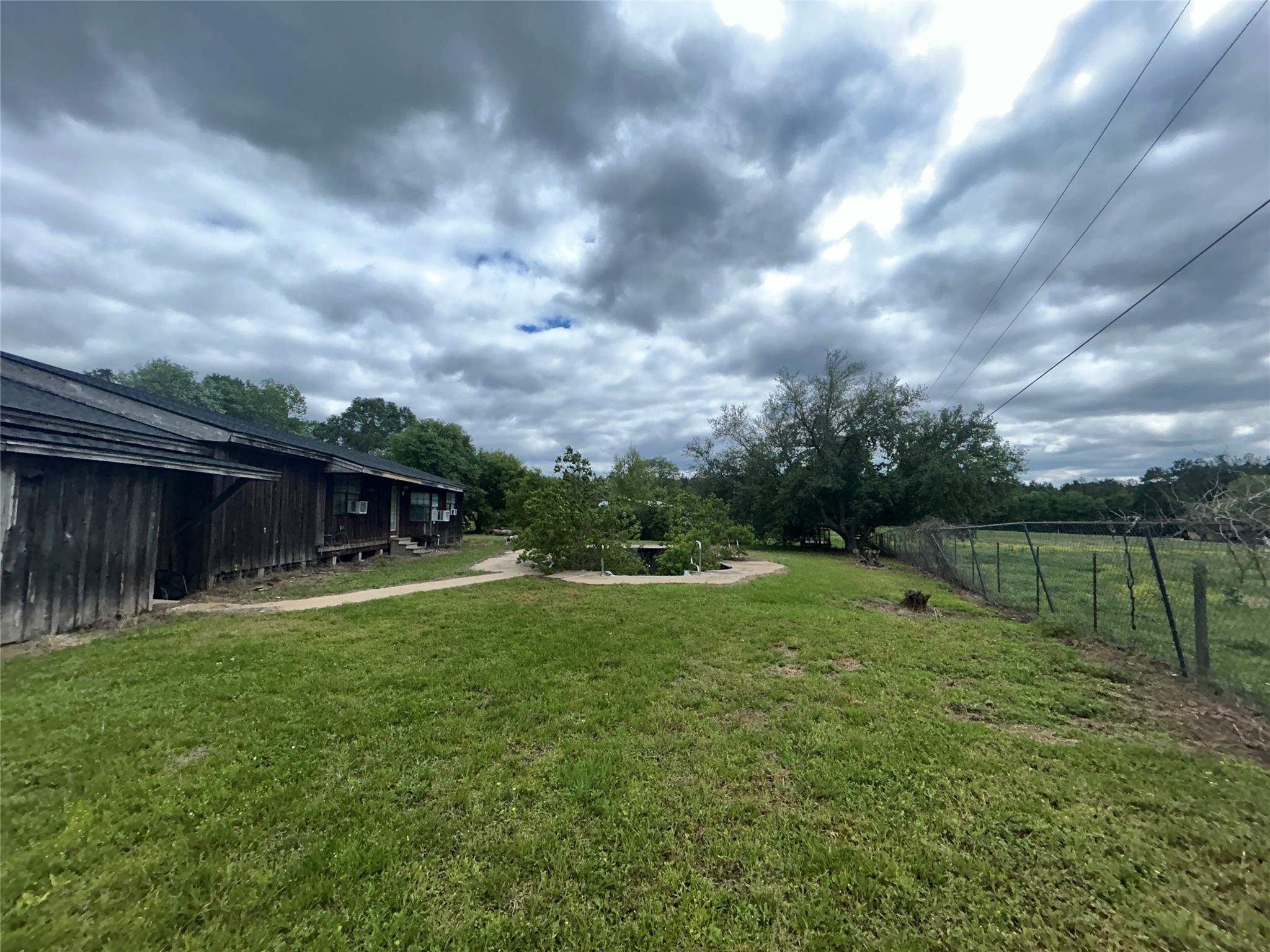 217 County Road 3083 Call, TX 75933 - Photo 11 of 38 a view of a backyard