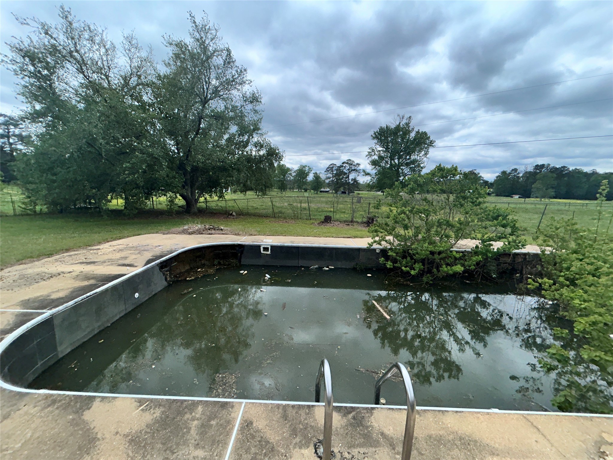 217 County Road 3083 Call, TX 75933 - Photo 14 of 38 a view of swimming pool from a lake