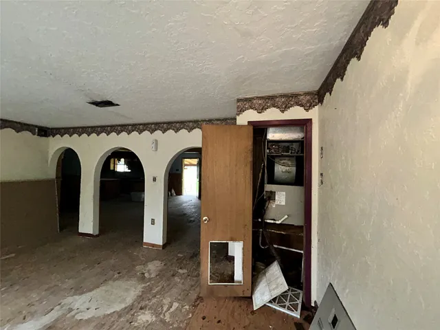 a view of a room with a balcony