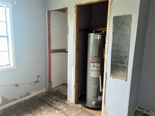 a view of deck with wooden floor and roof with floor to ceiling windows