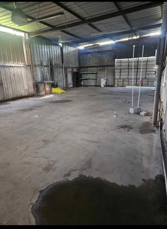 a view of a empty room with storage