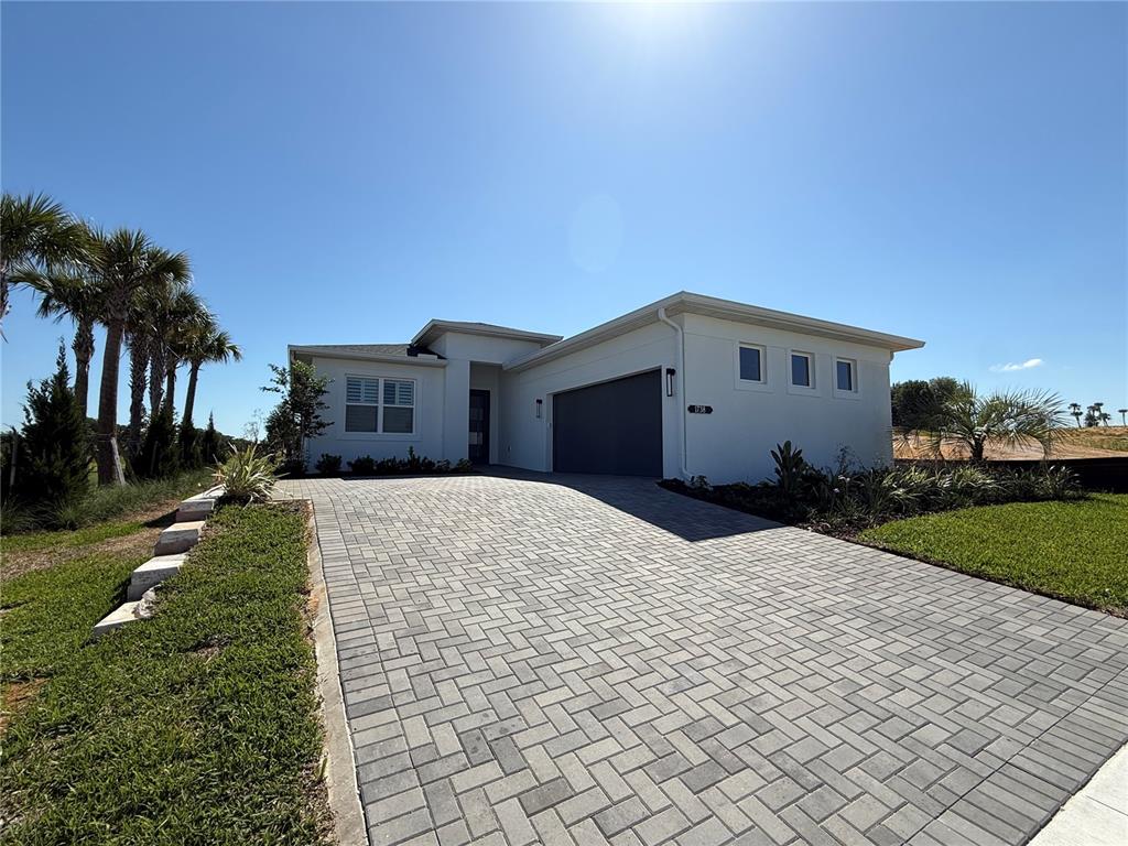 1738 Point Grace Road Tavares, FL 32778 - Photo 1 of 1 a house view with a backyard space