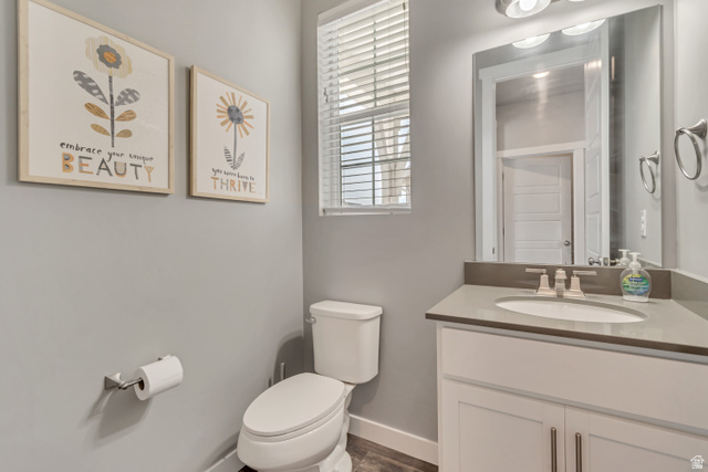 3232 West 1670th Street North Provo, UT 84601 - Photo 7 of 33 Bathroom featuring vanity and dark wood finished floors