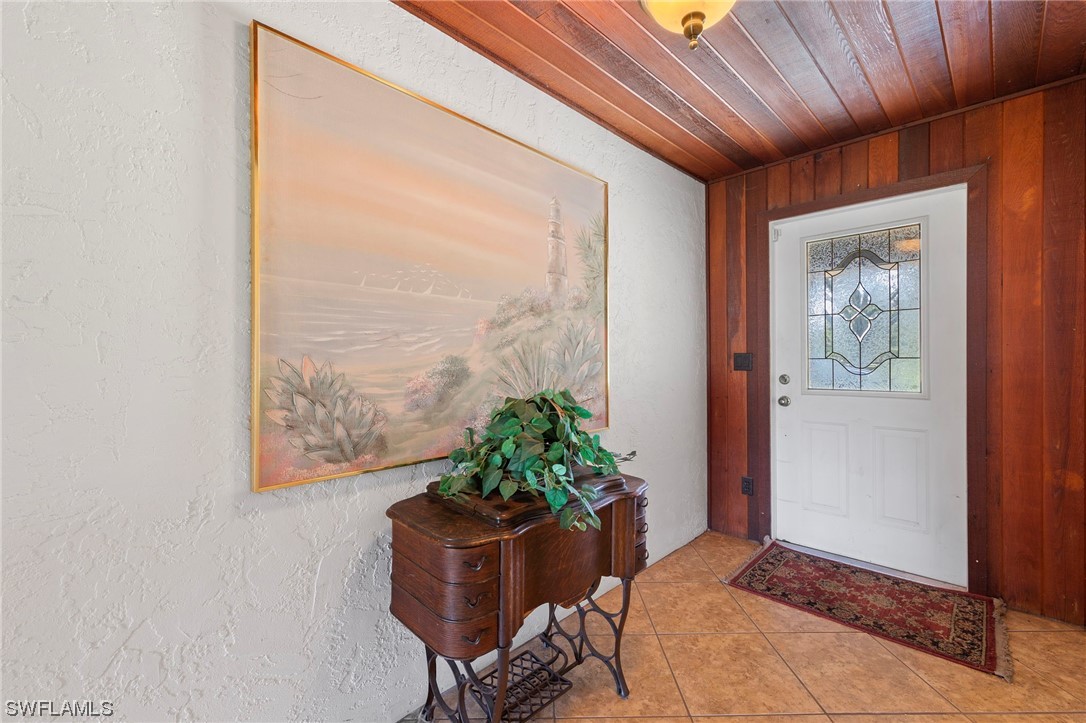 13751 River Road Fort Myers, FL 33905 - Photo 11 of 50 a room with furniture and a potted plant