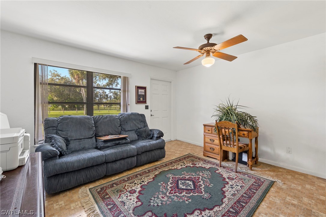 13751 River Road Fort Myers, FL 33905 - Photo 17 of 50 a living room with furniture and a window