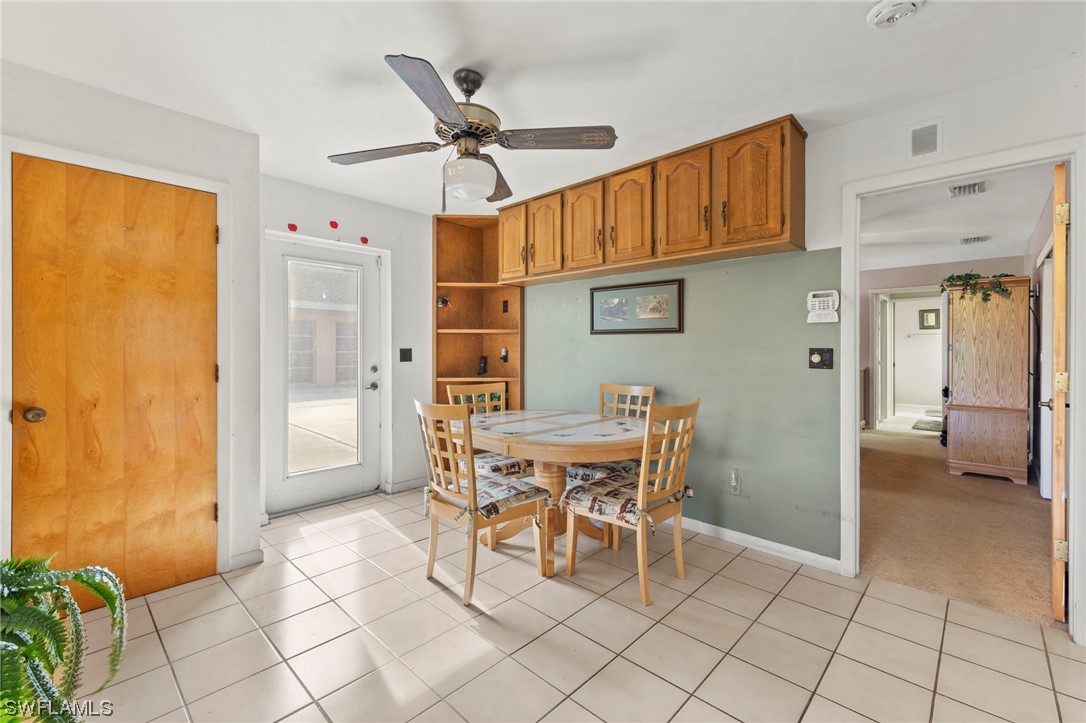 13751 River Road Fort Myers, FL 33905 - Photo 18 of 50 a dining room with furniture and window
