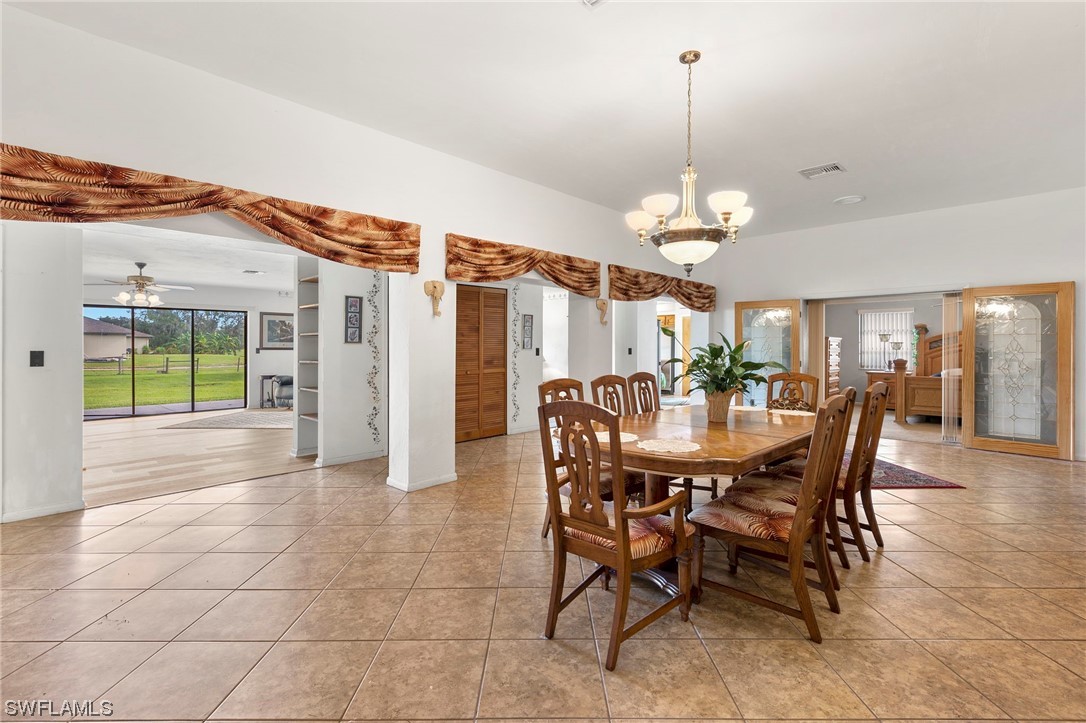 13751 River Road Fort Myers, FL 33905 - Photo 24 of 50 a view of a dining room with furniture window and outside view