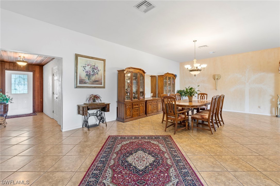 13751 River Road Fort Myers, FL 33905 - Photo 25 of 50 a view of a dining room with furniture