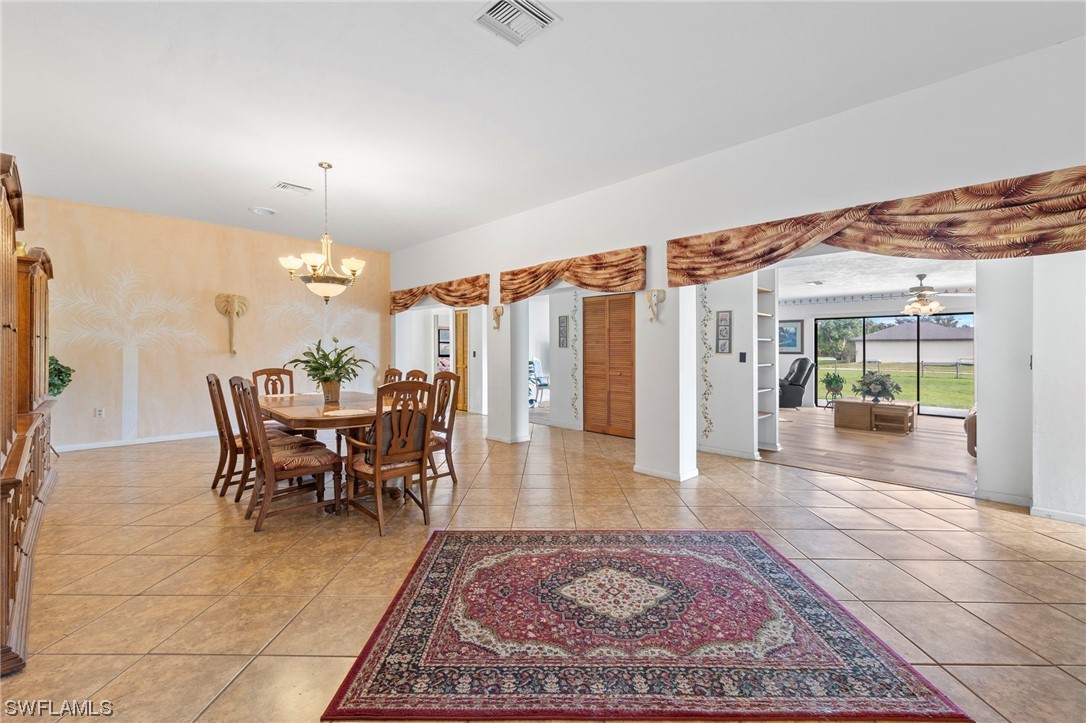 13751 River Road Fort Myers, FL 33905 - Photo 27 of 50 a view of a dining room with furniture