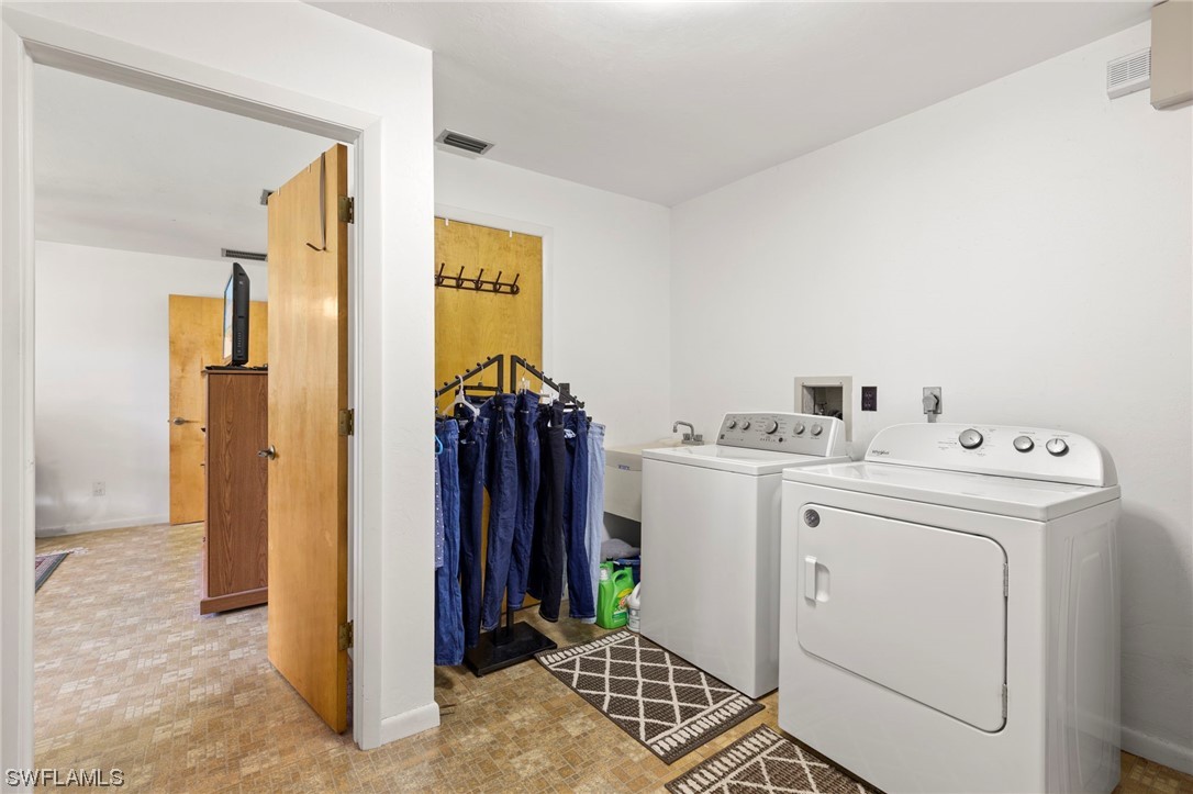 13751 River Road Fort Myers, FL 33905 - Photo 28 of 50 a room with storage and utility