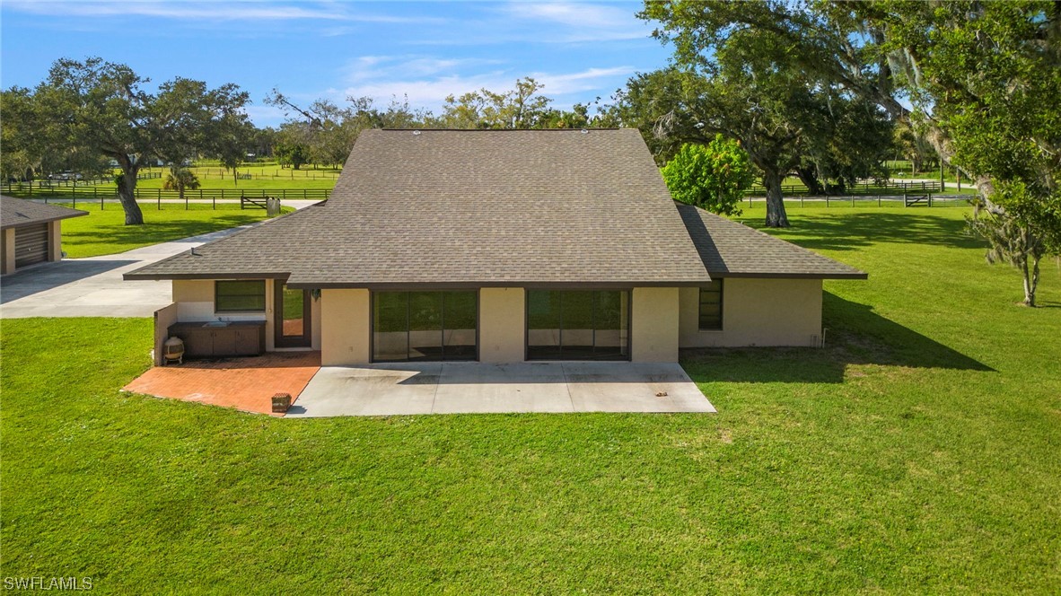 13751 River Road Fort Myers, FL 33905 - Photo 5 of 50 an aerial view of a house with swimming pool garden and outdoor seating