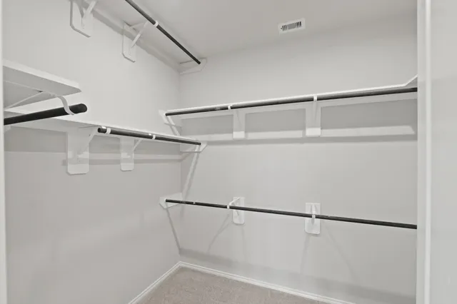 a view of a room with racks on the wall