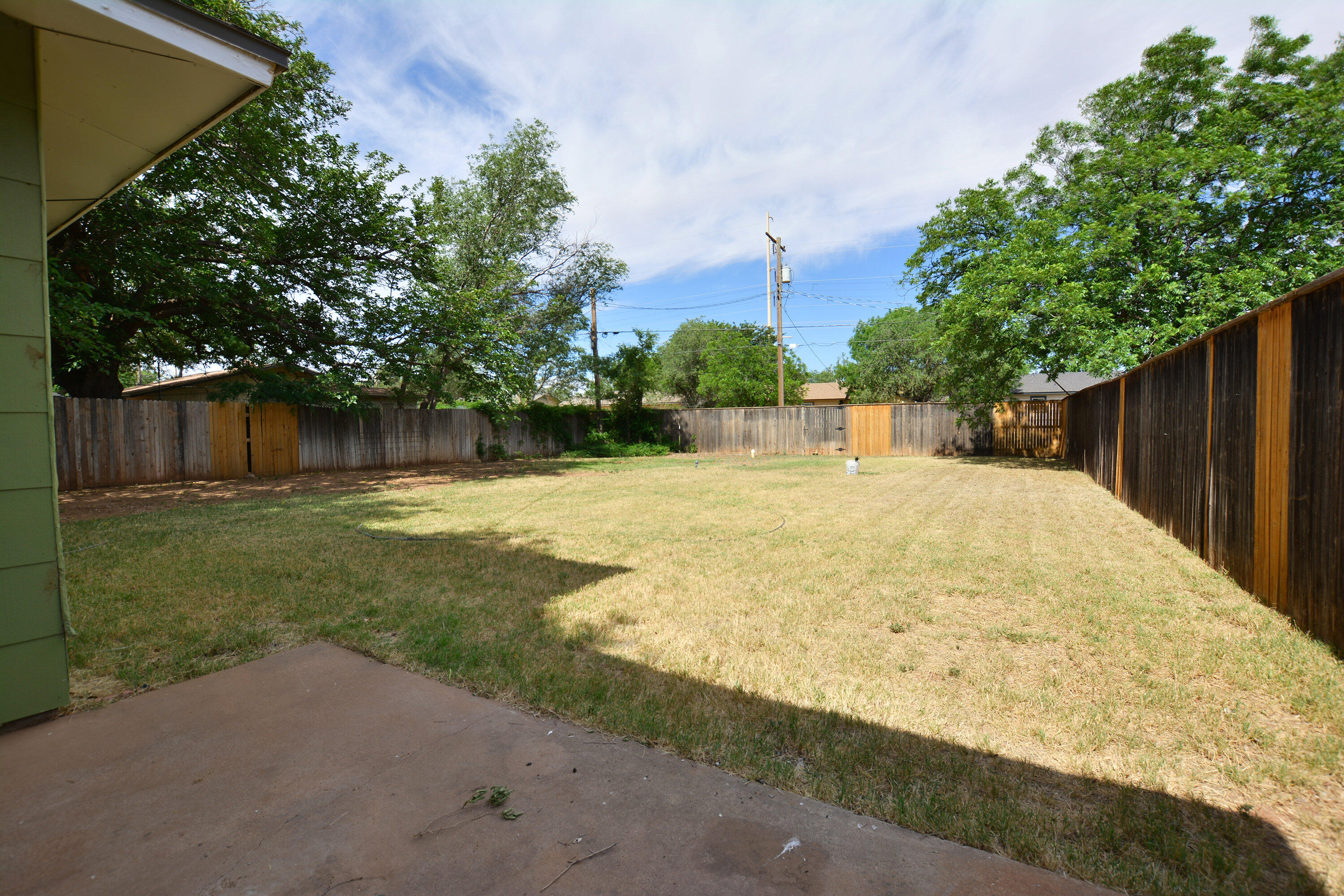 4608 Detroit Avenue Lubbock, TX 79413 - Photo 17 of 20 a view of backyard with green space