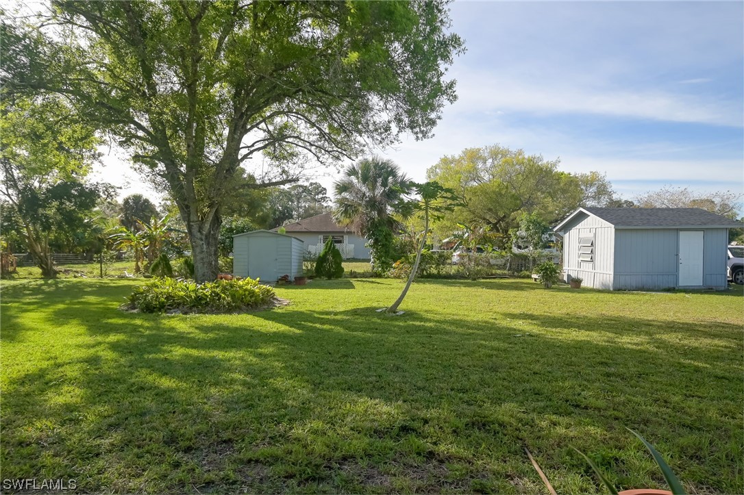 15450 Cemetery Road Fort Myers, FL 33905 - Photo 29 of 29 a swimming pool with wooden fence
