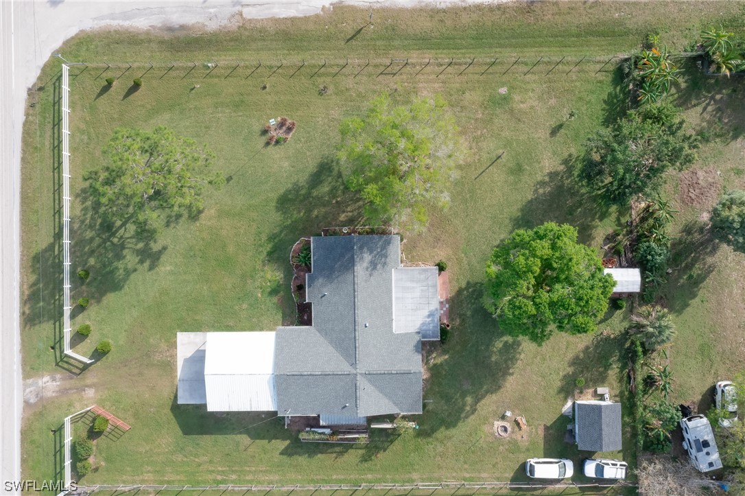 15450 Cemetery Road Fort Myers, FL 33905 - Photo 4 of 29 an aerial view of residential houses with outdoor space
