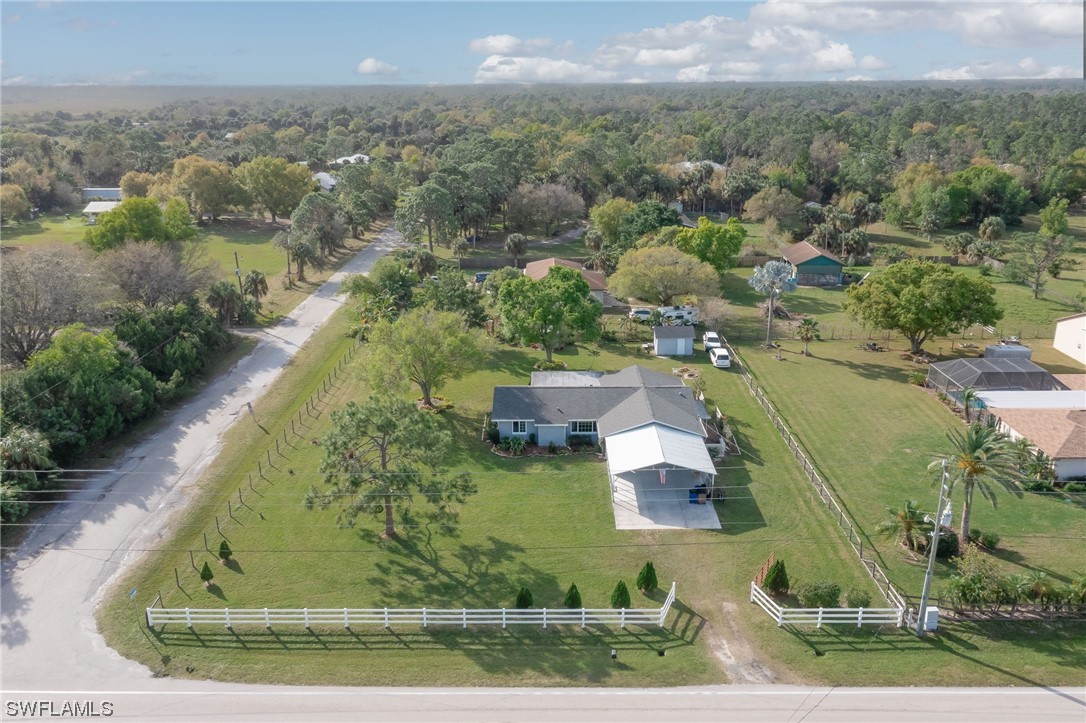 15450 Cemetery Road Fort Myers, FL 33905 - Photo 8 of 29 an aerial view of a house with a yard