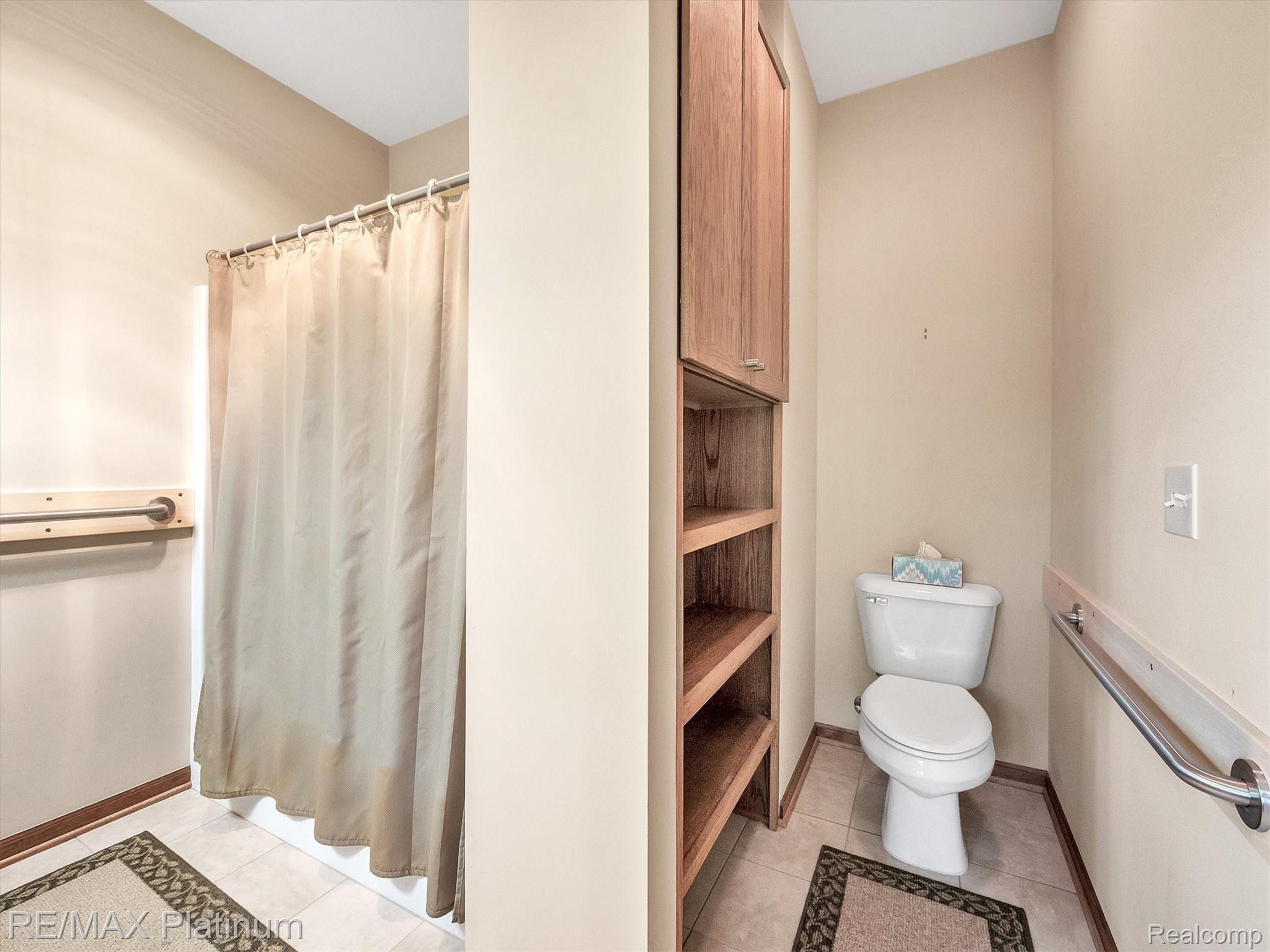 11061 Wiggins Road Howell, MI 48855 - Photo 20 of 79 SPACIOUS MASTER BATH WITH GRAB BARS
