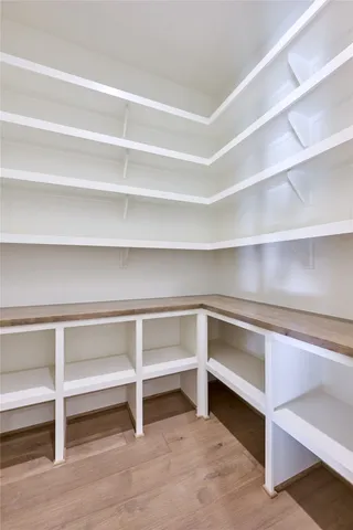 a view of an empty room with empty racks
