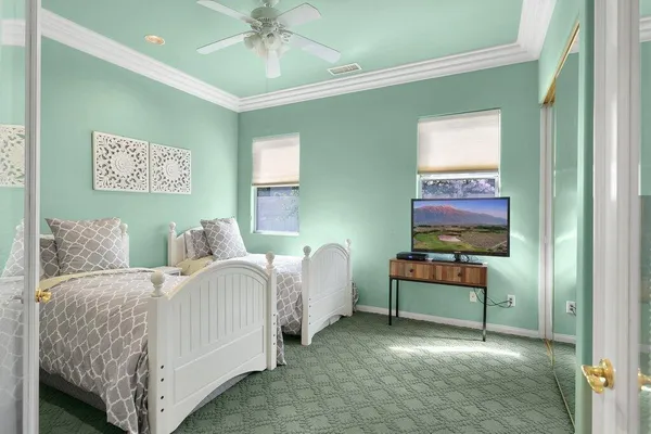 a living room with a bed and furniture