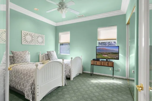 a living room with a bed and furniture