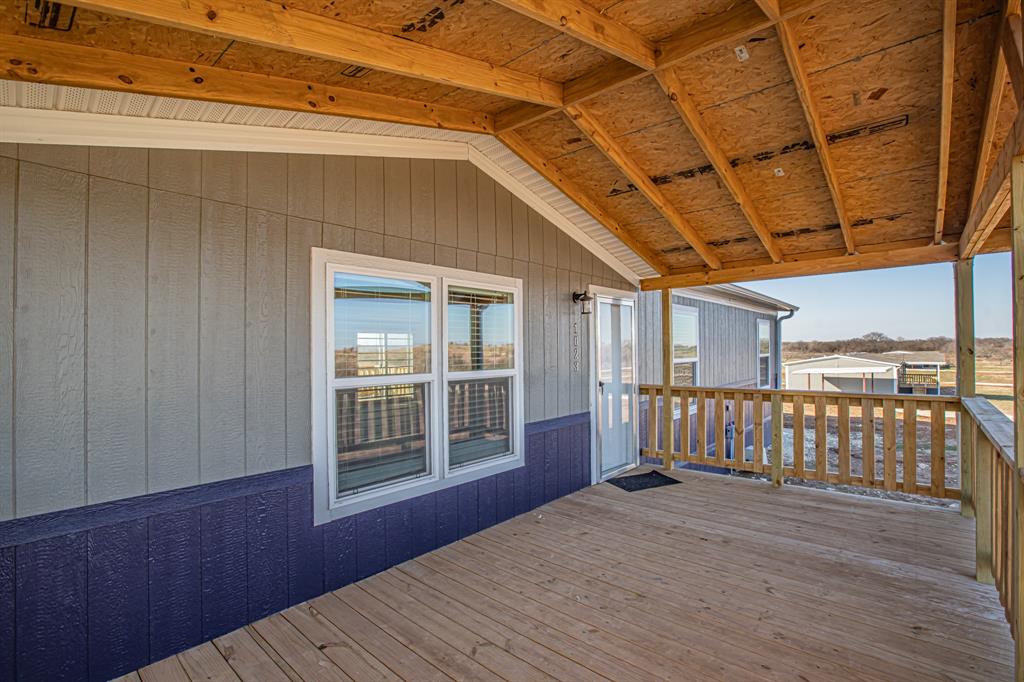1023 Hopewell Road Bowie, TX 76230 - Photo 5 of 28 a view of a balcony