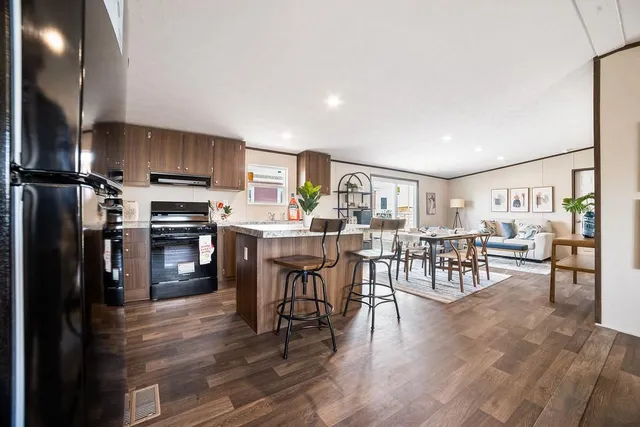 a view of a kitchen and dining room