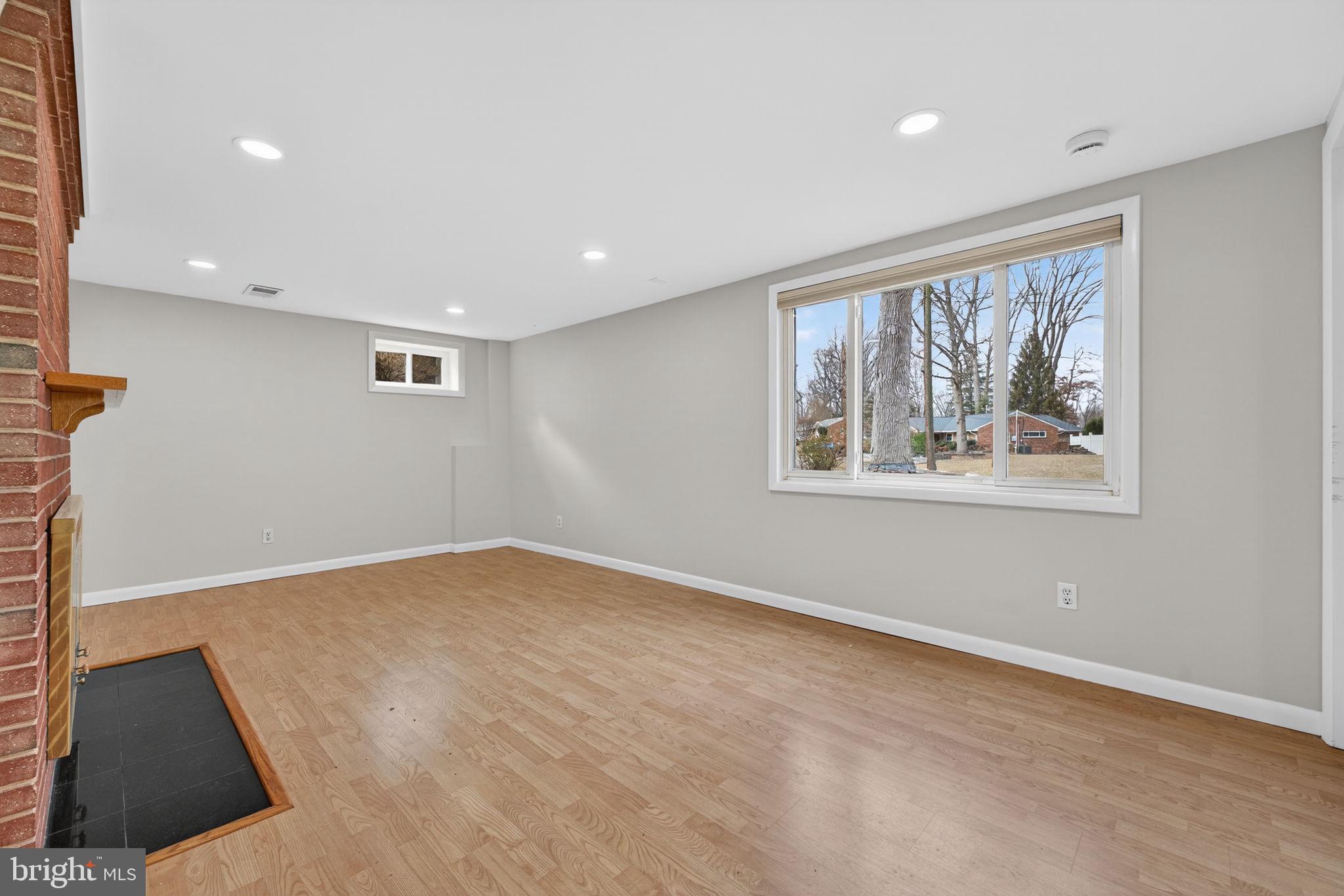 7507 Murillo Street Springfield, VA 22151 - Photo 15 of 44 an empty room with windows