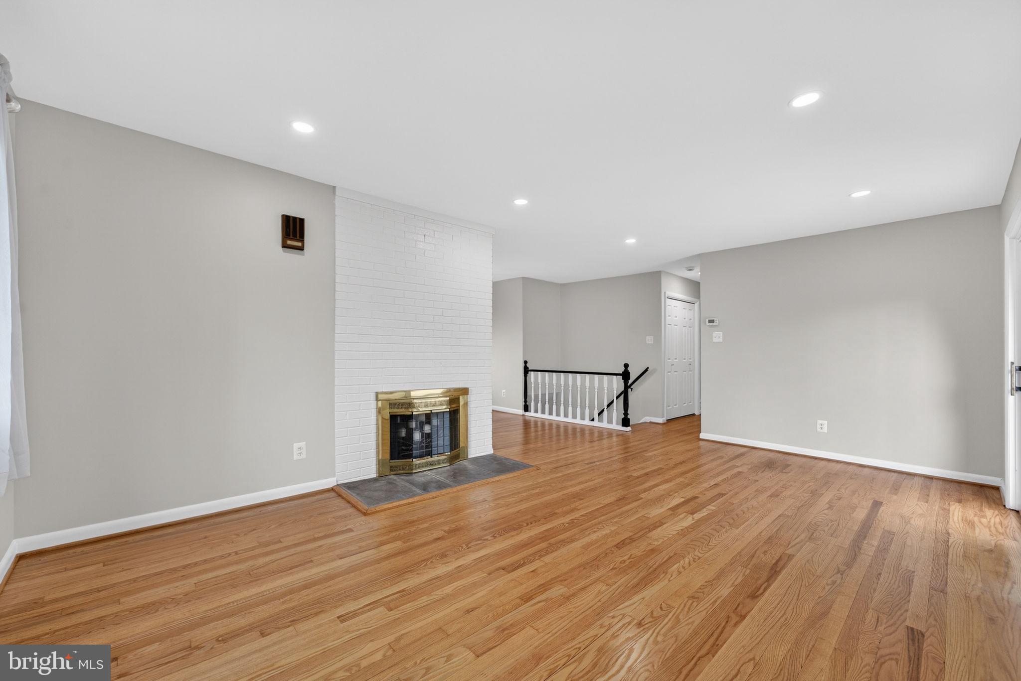 7507 Murillo Street Springfield, VA 22151 - Photo 18 of 44 a view of empty room with wooden floor