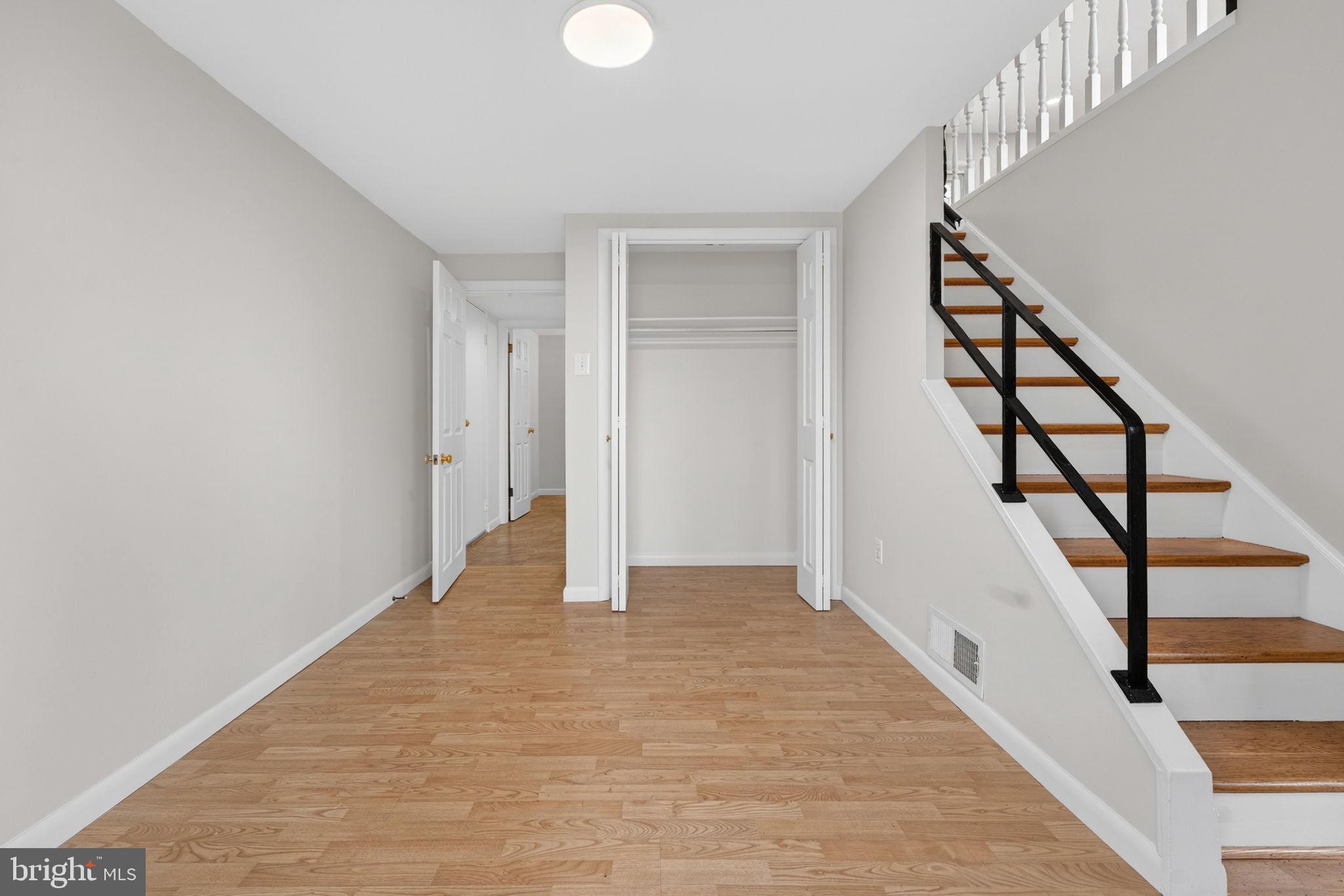 7507 Murillo Street Springfield, VA 22151 - Photo 2 of 44 a view of an entryway with wooden floor