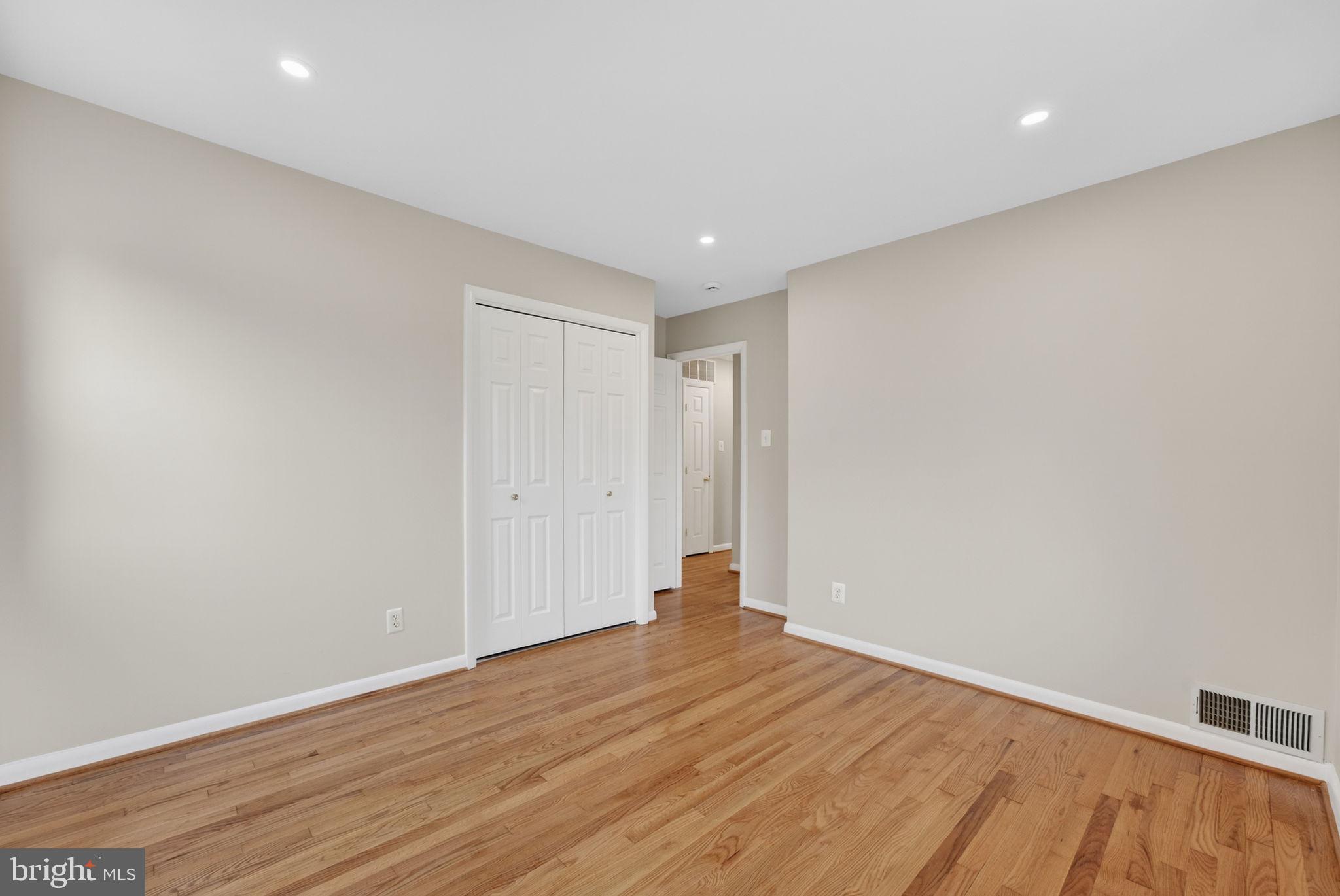 7507 Murillo Street Springfield, VA 22151 - Photo 32 of 44 a view of room with wooden floor