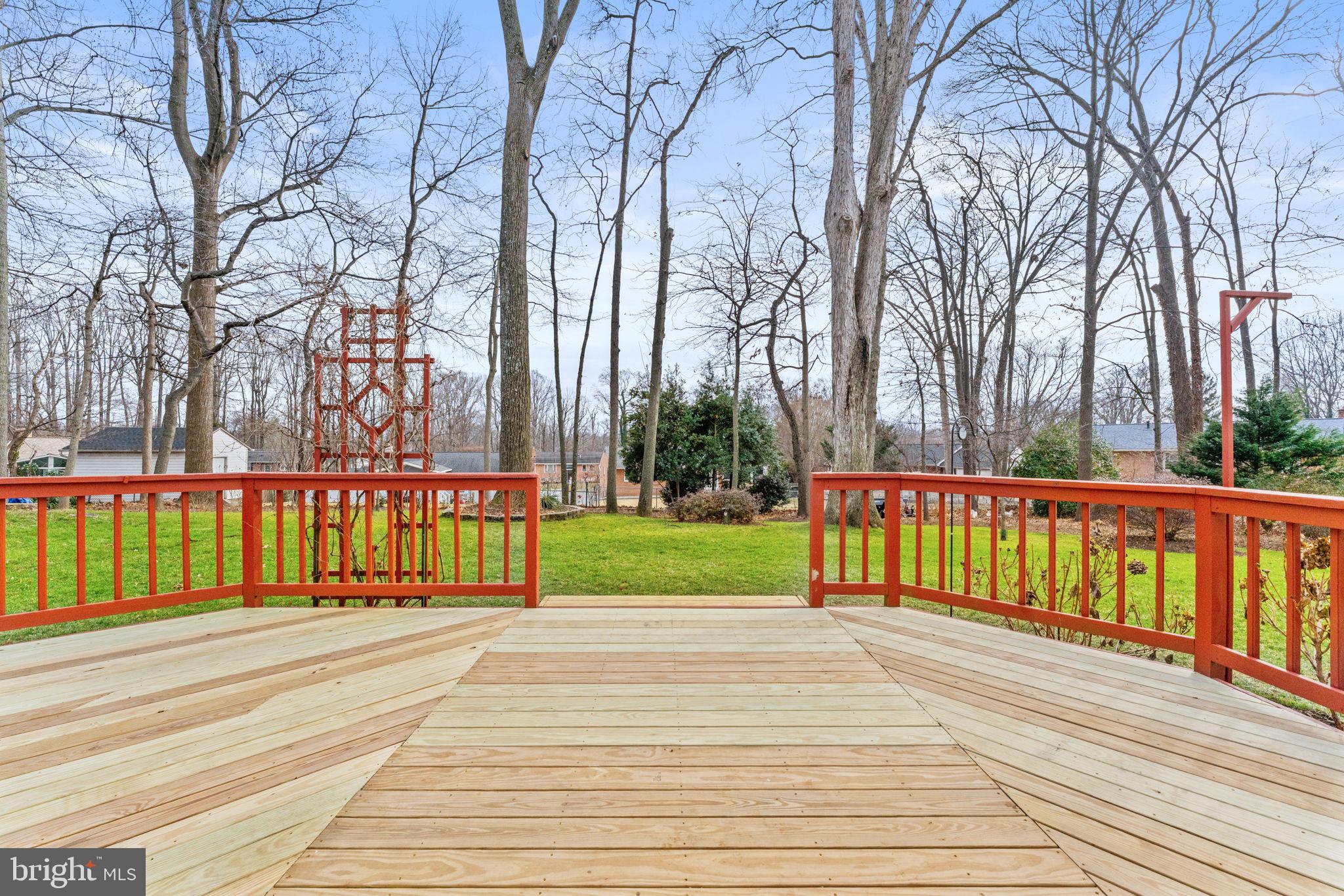 7507 Murillo Street Springfield, VA 22151 - Photo 35 of 44 a view of street with wooden fence