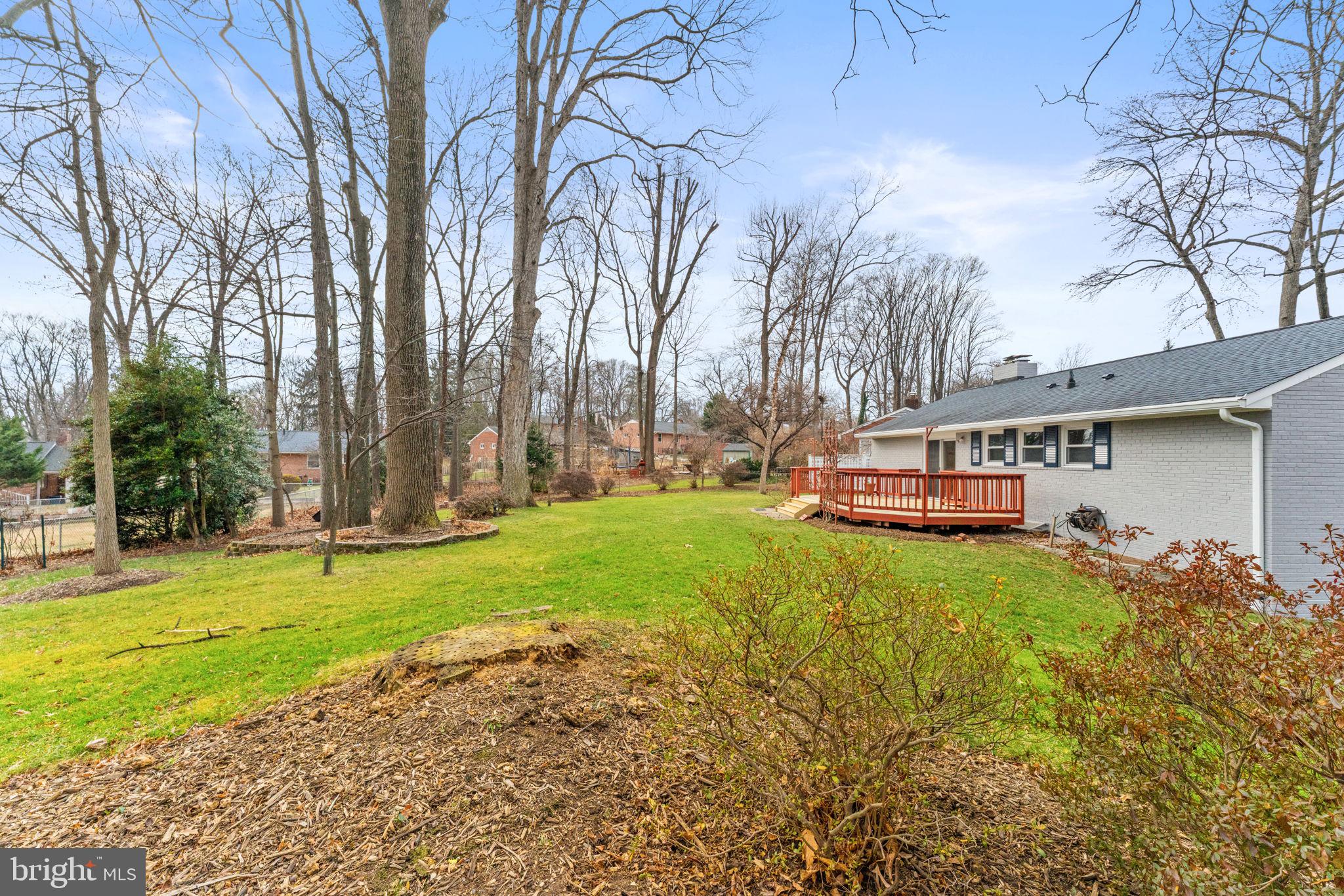 7507 Murillo Street Springfield, VA 22151 - Photo 40 of 44 a view of a house with backyard and sitting area