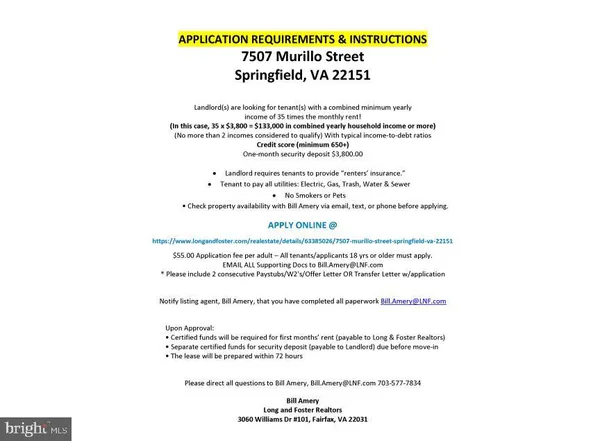 a front view of a house with a yard table and chairs