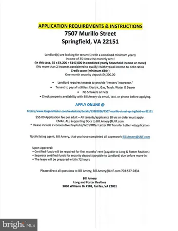 a front view of a house with a yard table and chairs