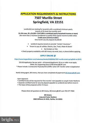 a front view of a house with a yard table and chairs