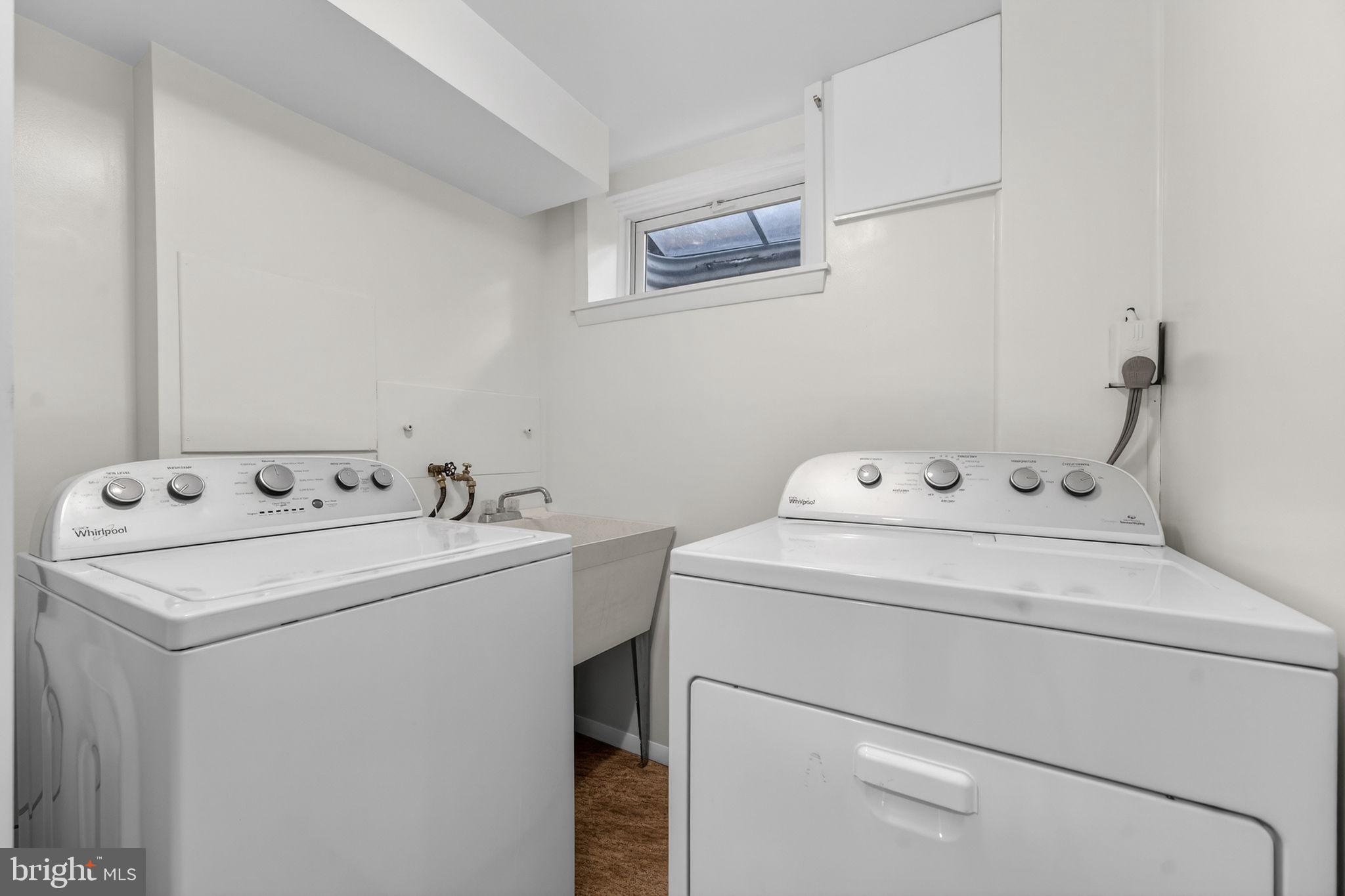 7507 Murillo Street Springfield, VA 22151 - Photo 6 of 44 a utility room with dryer and washer